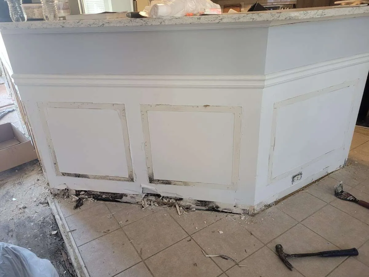 Water damage and mold on kitchen during Storm Damage Restoration in Loveland